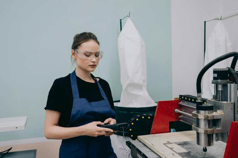 woman using manufacturing barcode scanner