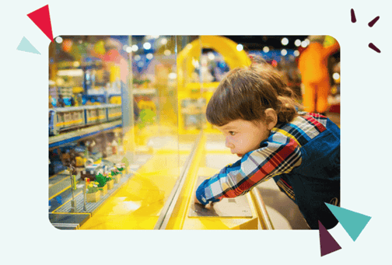 kid in a lego shop