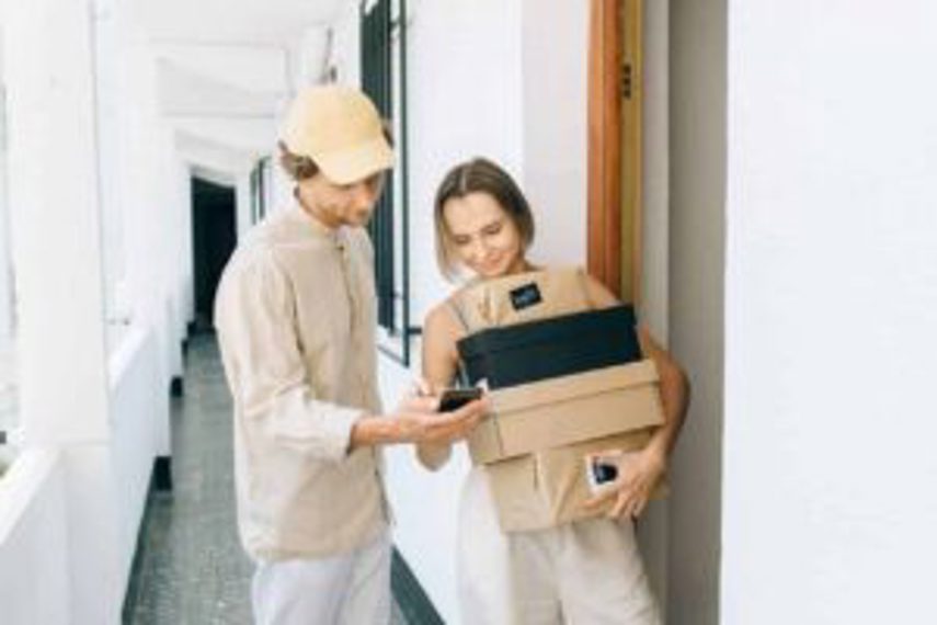 A woman receiving an eCommerce package