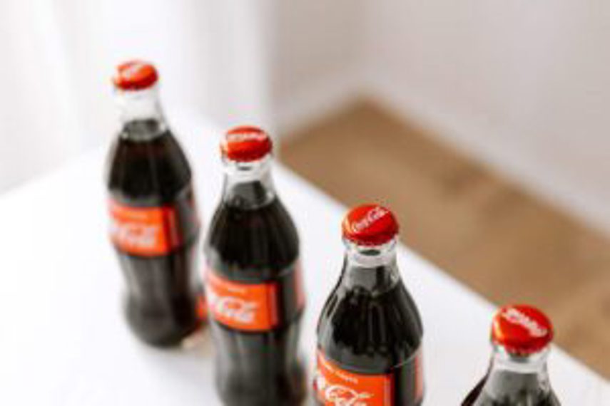 Coca-cola bottles lined up