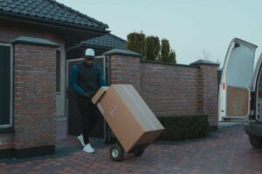 A man delivers goods to a customer