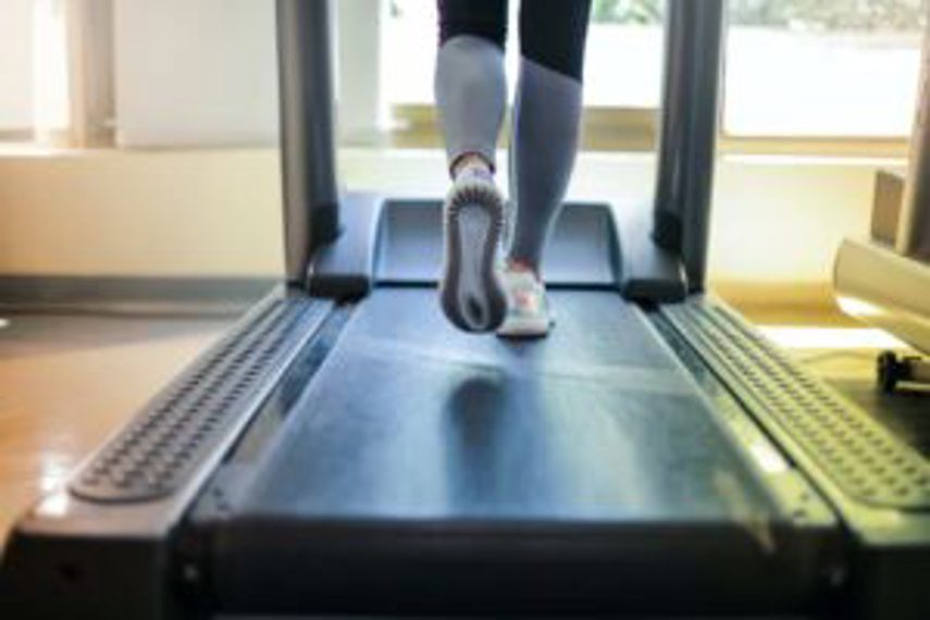 A person walking on a treadmill