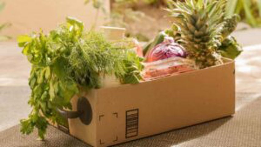 A delivery of vegetables and fruit in a box