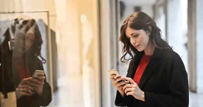 Woman using endless aisle retail strategy