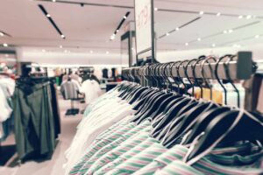 Clothing on racks in a store