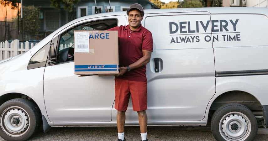 delivery man holding box